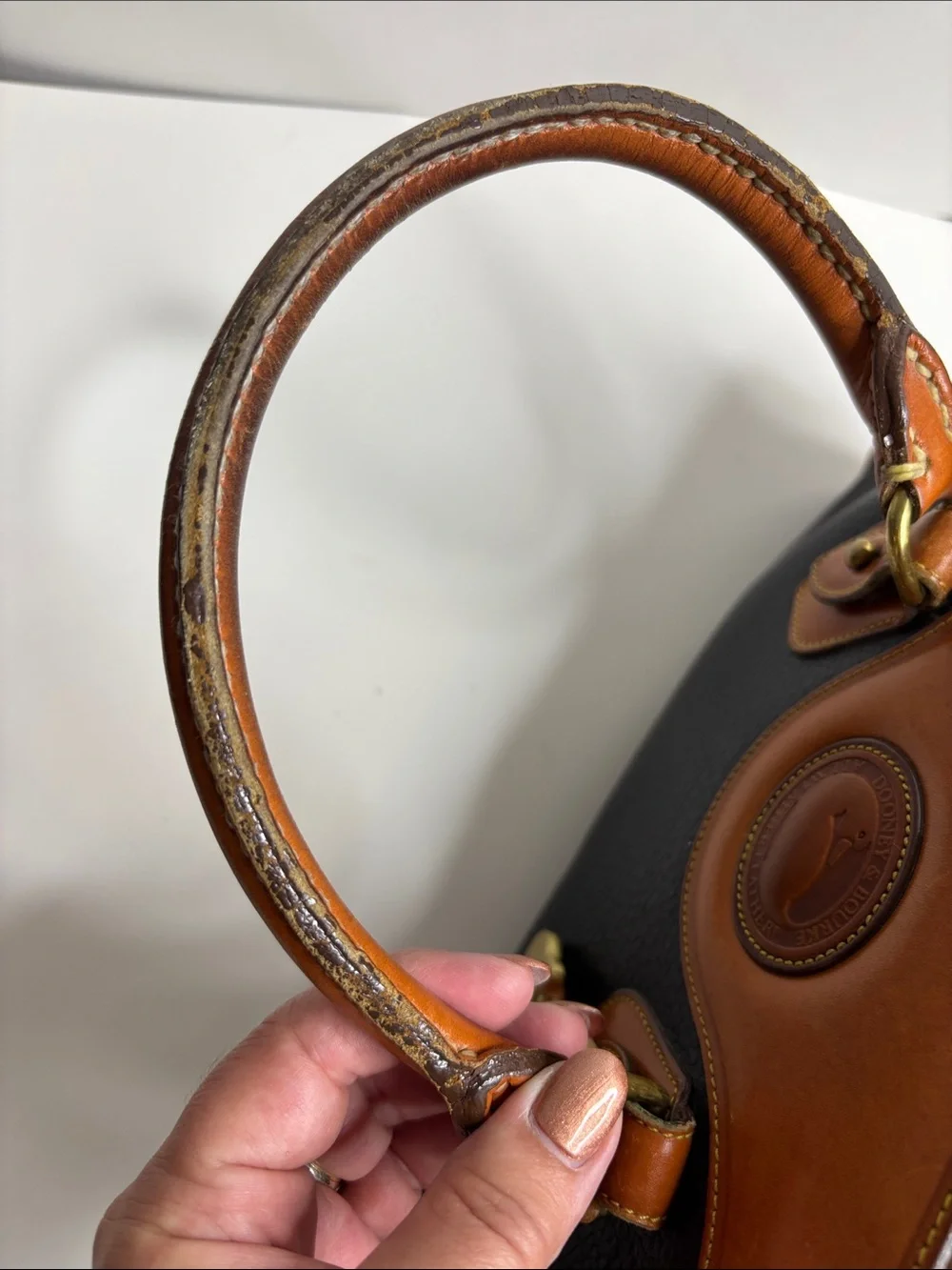 Dooney & Bourke Black Pebbled Leather Satchel with Tan Trim